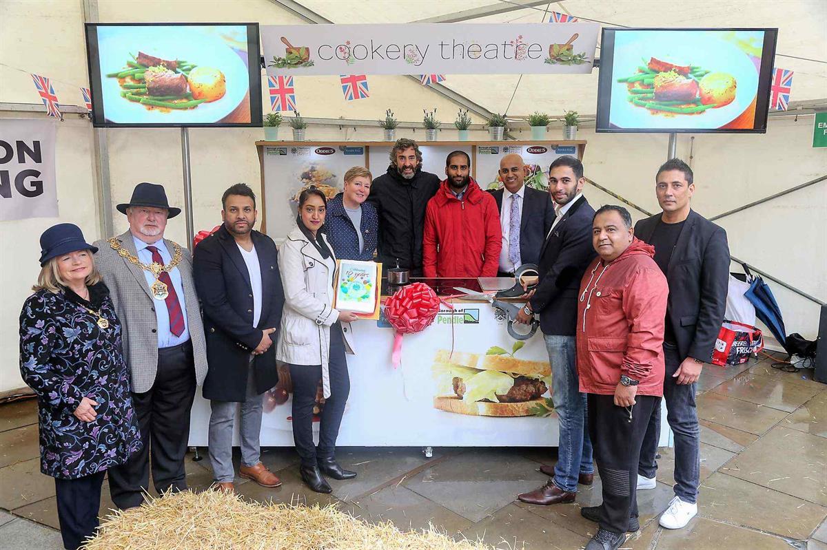 council stood in front of a food stall